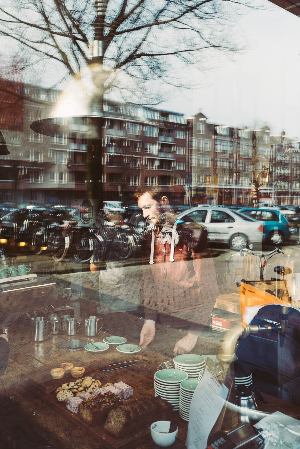 Barista at Lot Sixty One Coffee Roasters in Amsterdam