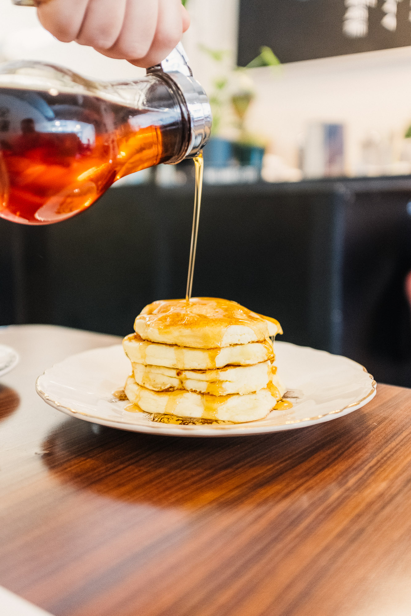 Fluffy pancakes and syrup at Millmans Restaurant - Verdun - Montreal