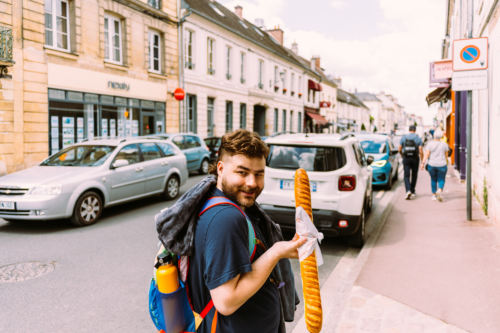 Jérémie and the baguette viennoise fresh from the boulangerie in Chantilly - Best Day Trip From Paris