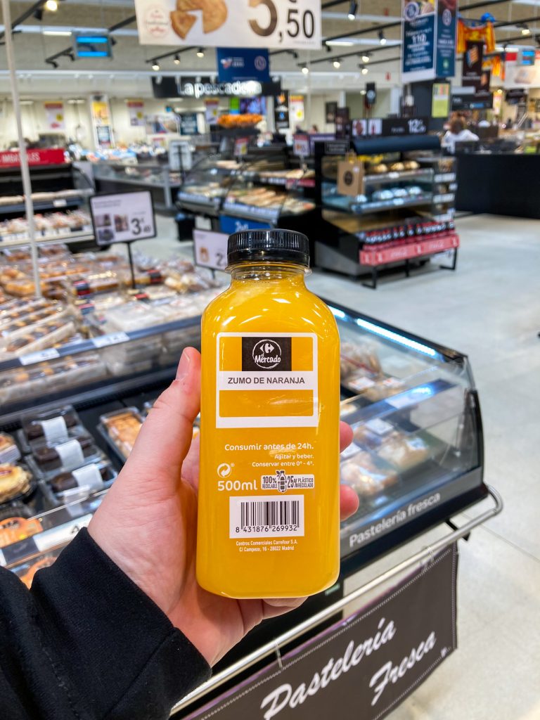 Fresh orange juice at Carrefour Market in Valencia, Spain - Best Things To Do - Jeff On The Road
